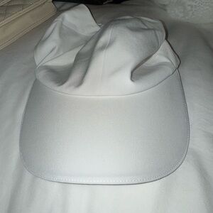 Lululemon white hat.